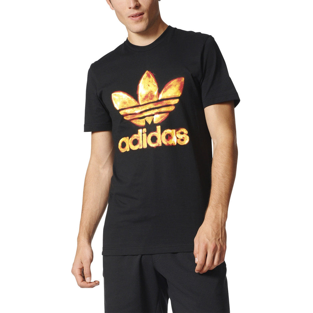 adidas t-shirt in black with gold logo